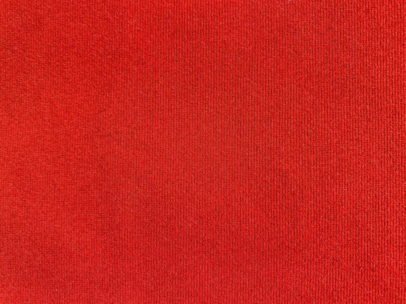 Red velvet fabric texture used as background. Empty red fabric background of soft and smooth textile material. There is space for text. photo