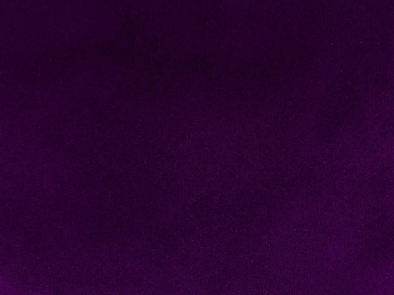 Purple velvet fabric texture used as background. Empty purple fabric background of soft and smooth textile material. There is space for text. photo