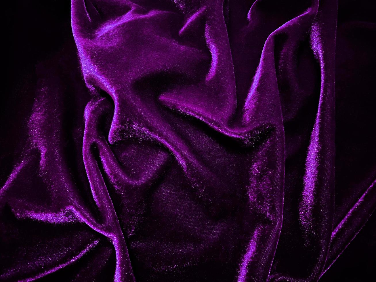 Purple velvet fabric texture used as background. Empty purple fabric background of soft and smooth textile material. There is space for text. photo