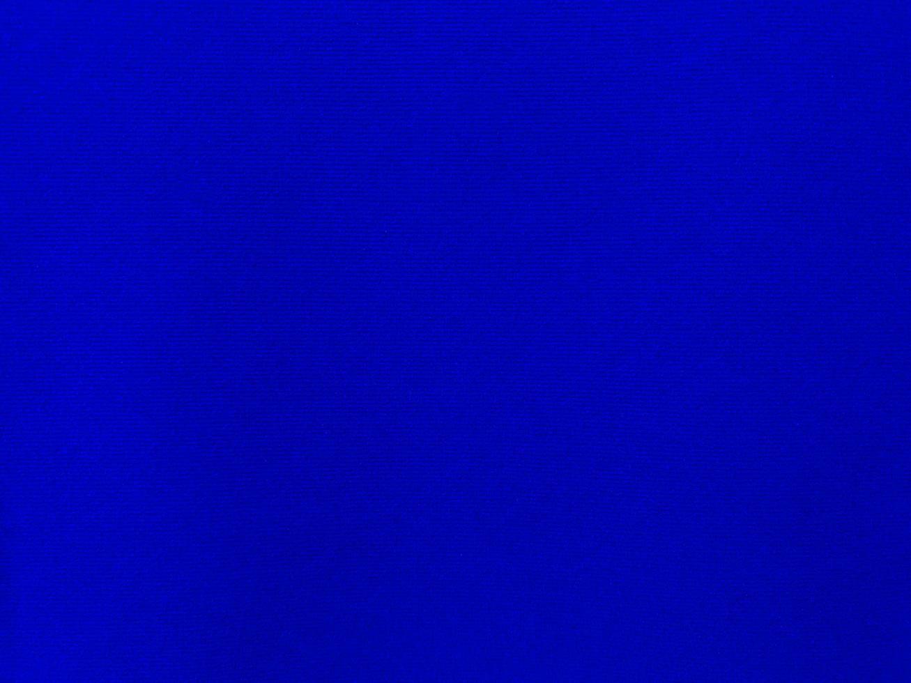 Blue velvet fabric texture used as background. Empty blue fabric background of soft and smooth textile material. There is space for text. photo