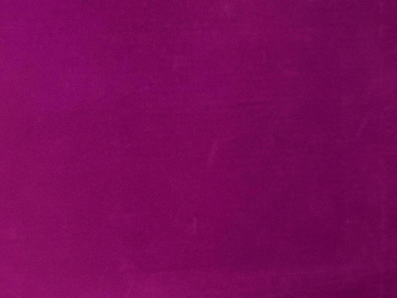 Magenta velvet fabric texture used as background. Empty magenta fabric background of soft and smooth textile material. There is space for text. photo