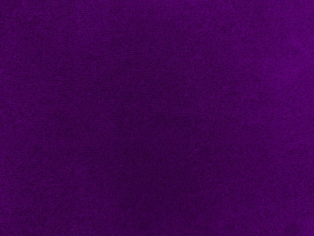 Purple velvet fabric texture used as background. Empty purple fabric background of soft and smooth textile material. There is space for text. photo