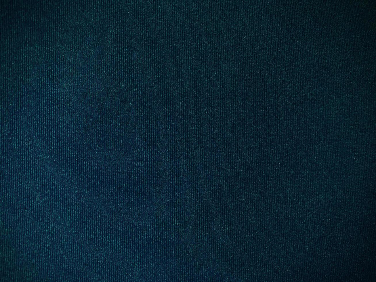 Dark blue velvet fabric texture used as background. Empty dark blue fabric background of soft and smooth textile material. There is space for text. photo