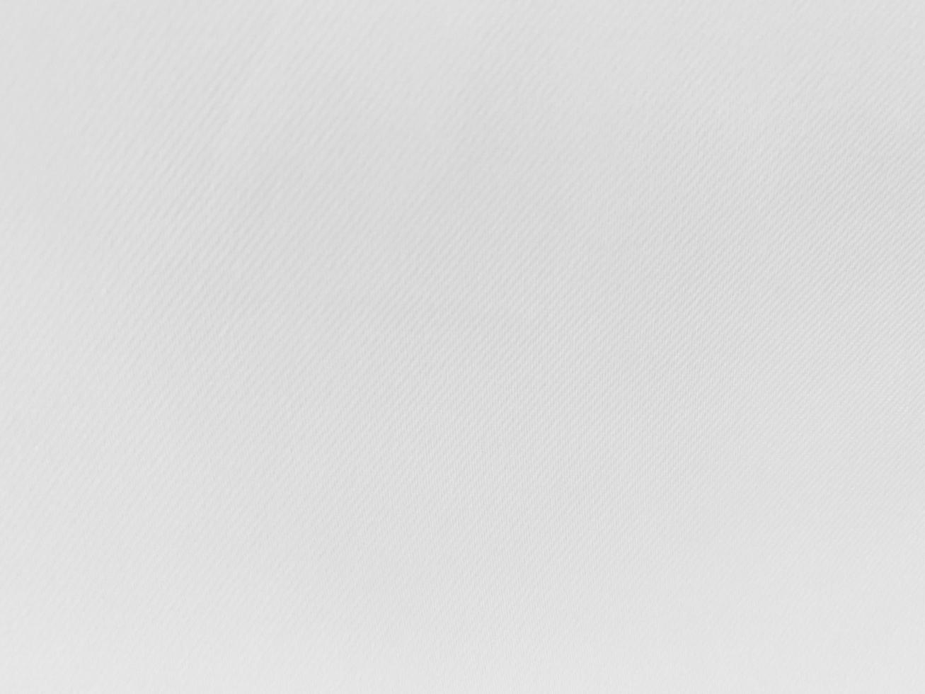The texture of the old white fabric has a vintage dullness, there is a text area for the background, used for vintage wallpapers and designs. photo