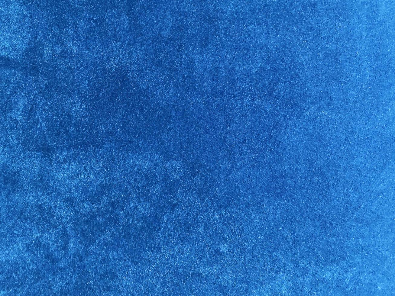 Light blue velvet fabric texture used as background. Empty light blue fabric background of soft and smooth textile material. There is space for text. photo