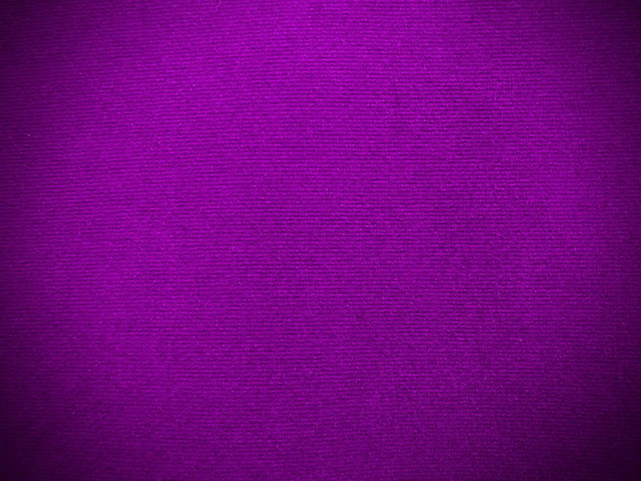 Purple velvet fabric texture used as background. Empty purple fabric background of soft and smooth textile material. There is space for text. photo