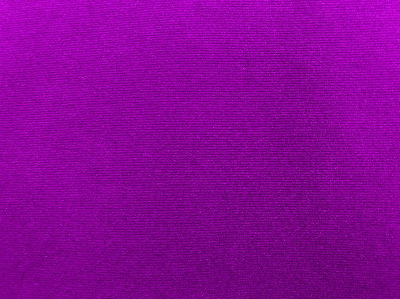 Purple velvet fabric texture used as background. Empty purple fabric background of soft and smooth textile material. There is space for text. photo