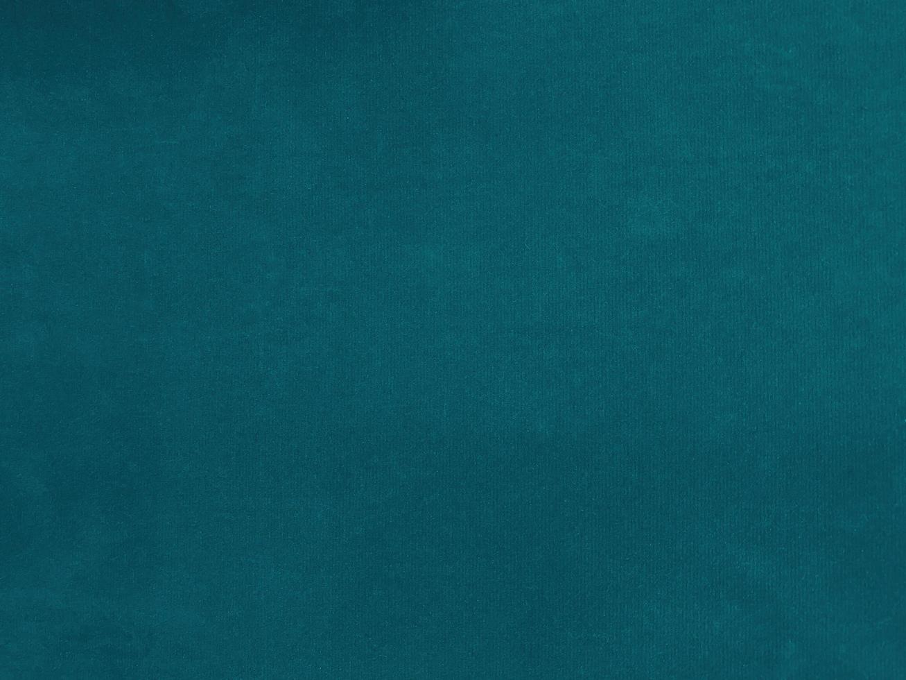 Dark green velvet fabric texture used as background. Empty dark green  fabric background of soft and smooth textile material. There is space for text. photo