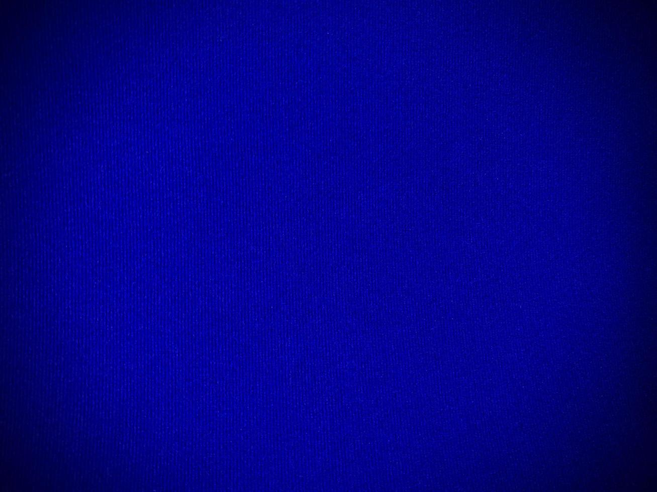 Dark blue velvet fabric texture used as background. Empty dark blue fabric background of soft and smooth textile material. There is space for text. photo