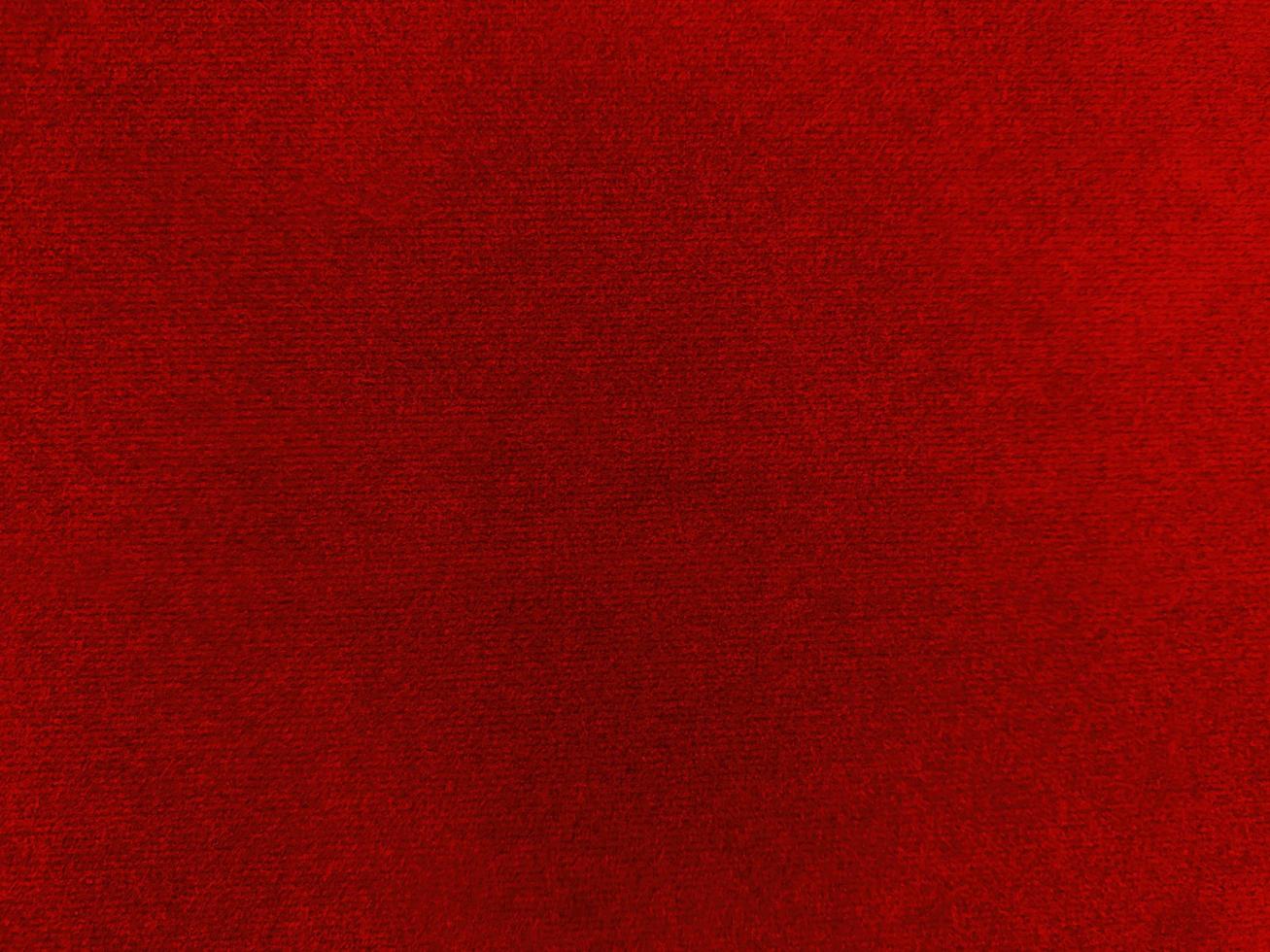 Red velvet fabric texture used as background. Empty Red fabric background of soft and smooth textile material. There is space for text. photo
