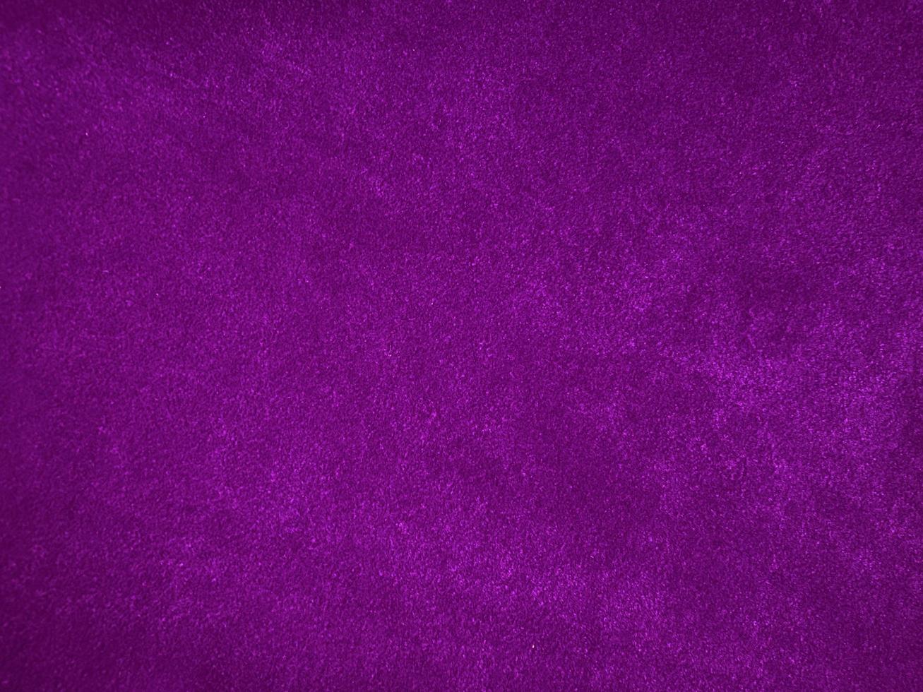 Dark purple old velvet fabric texture used as background. Empty purple fabric background of soft and smooth textile material. There is space for text... photo
