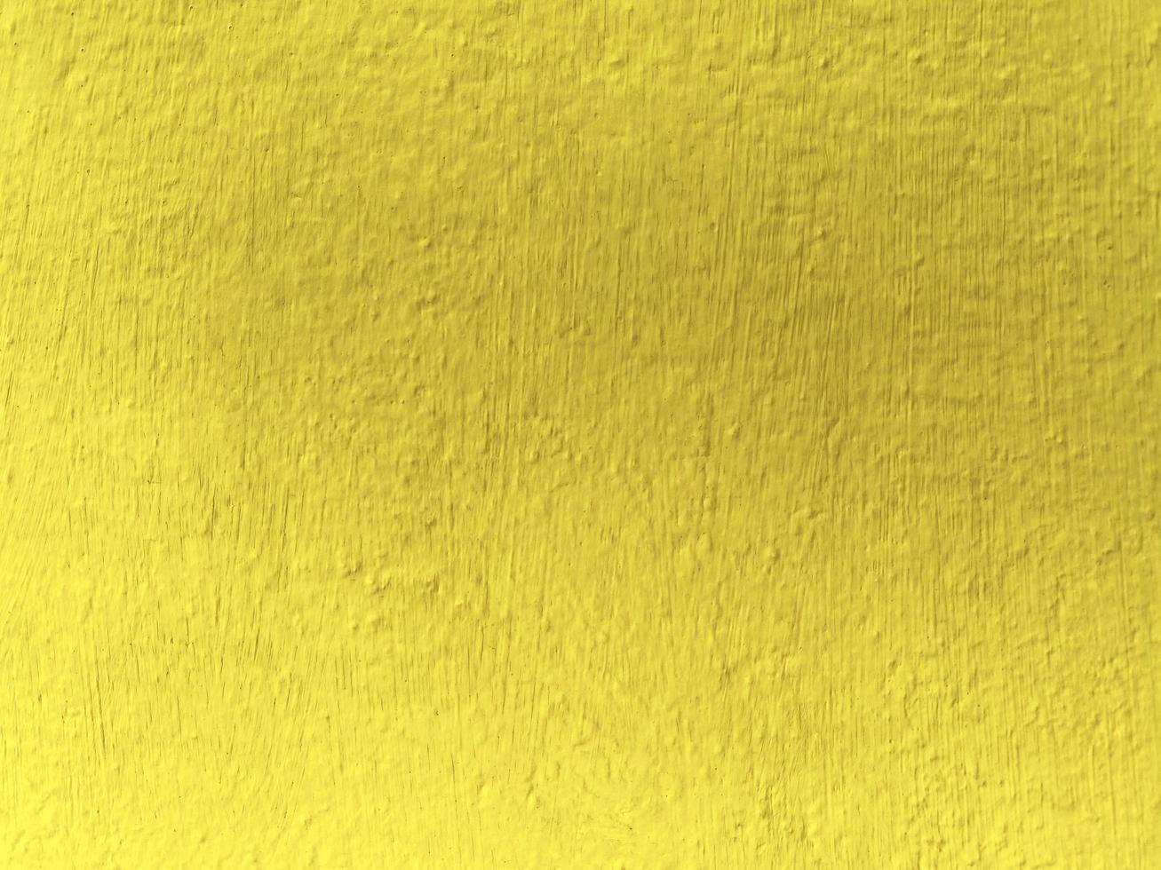 Seamless texture of yellow shadow cement old wall a rough surface, with space for text, for a background. photo