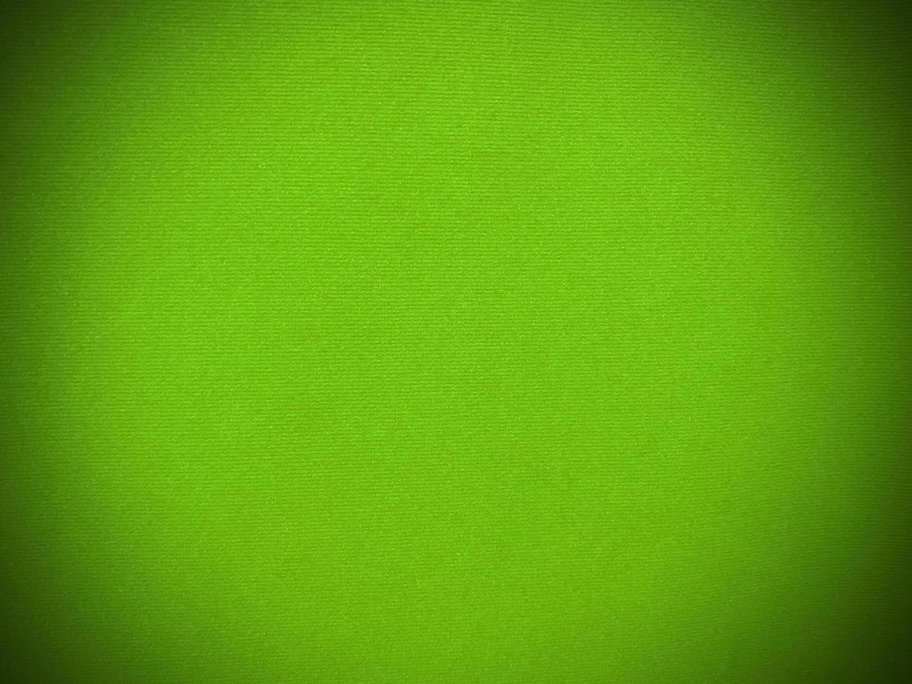 Light green velvet fabric texture used as background. Empty light green fabric background of soft and smooth textile material. There is space for text... photo