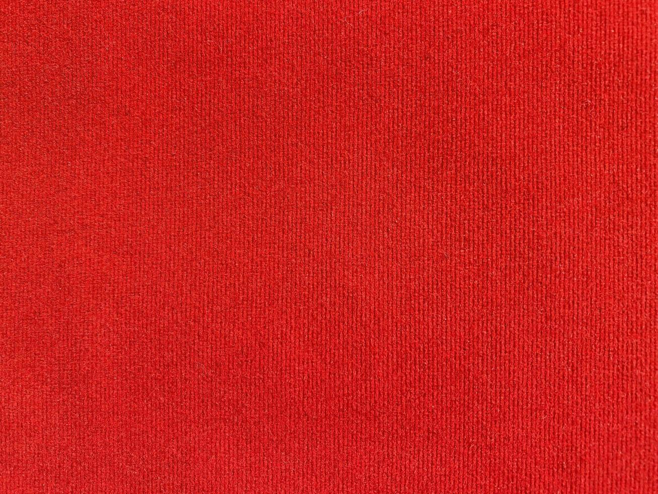Red velvet fabric texture used as background. Empty red fabric background of soft and smooth textile material. There is space for text. photo
