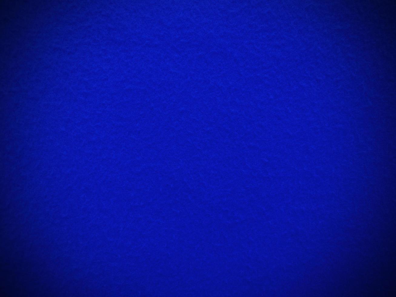 Felt  blue soft rough textile material background texture close up,poker table,tennis ball,table cloth. Empty blue fabric background. photo