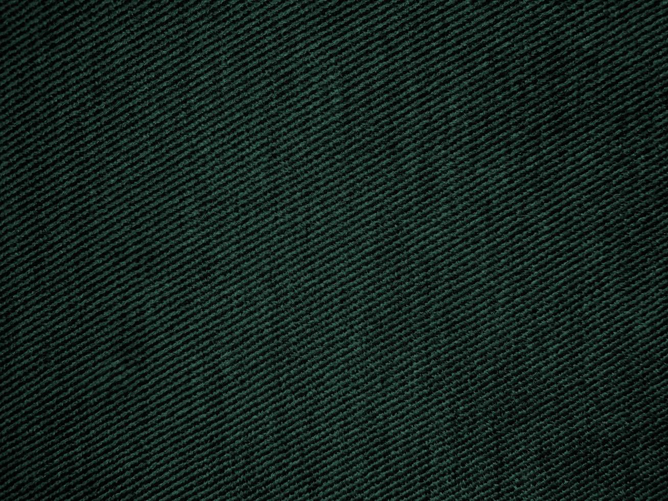Green ribbed corduroy texture background. Corduroy fabric texture used