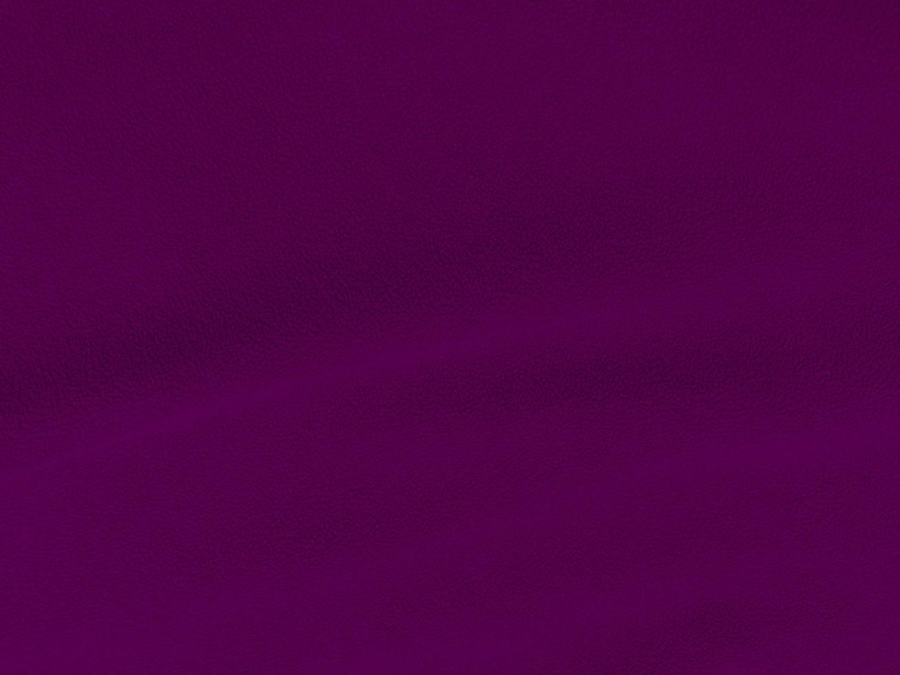 Dark violet  wool texture background. light natural sheep wool. purple seamless cotton. texture of fluffy fur for designers. close-up fragment red wool carpet.. photo