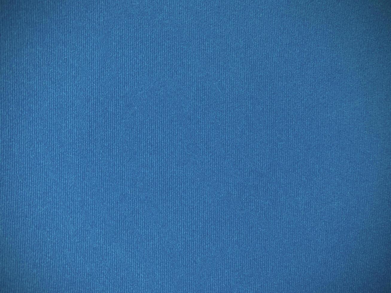 Blue velvet fabric texture used as background. Empty blue fabric background of soft and smooth textile material. There is space for text. photo