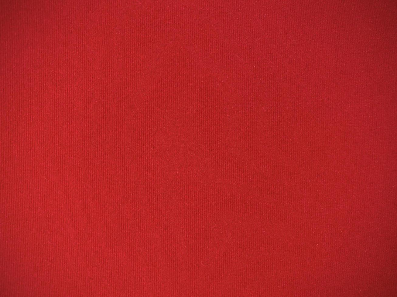 Red old velvet fabric texture used as background. Empty red fabric background of soft and smooth textile material. There is space for text.. photo
