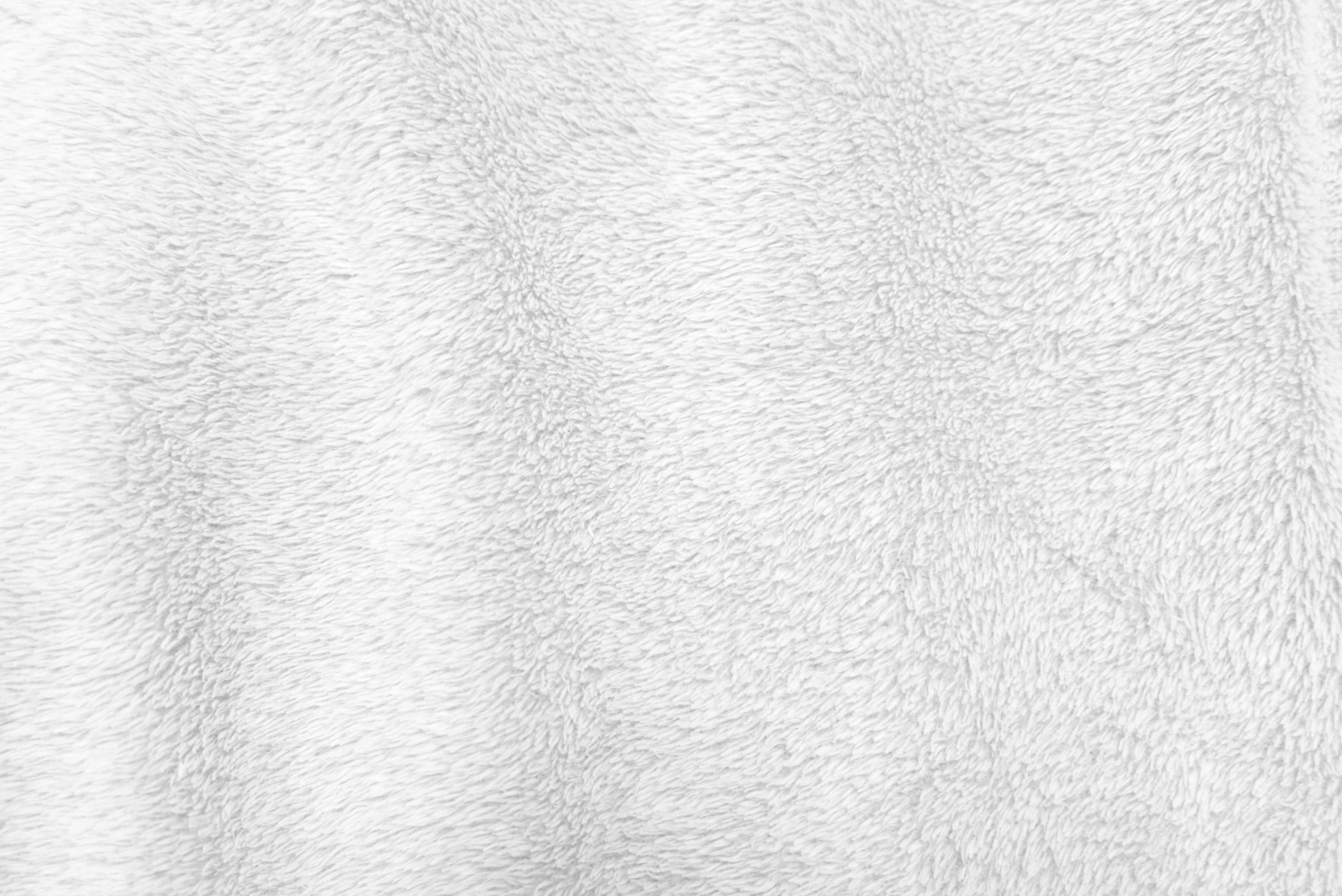 White clean wool texture background. light natural sheep wool. white