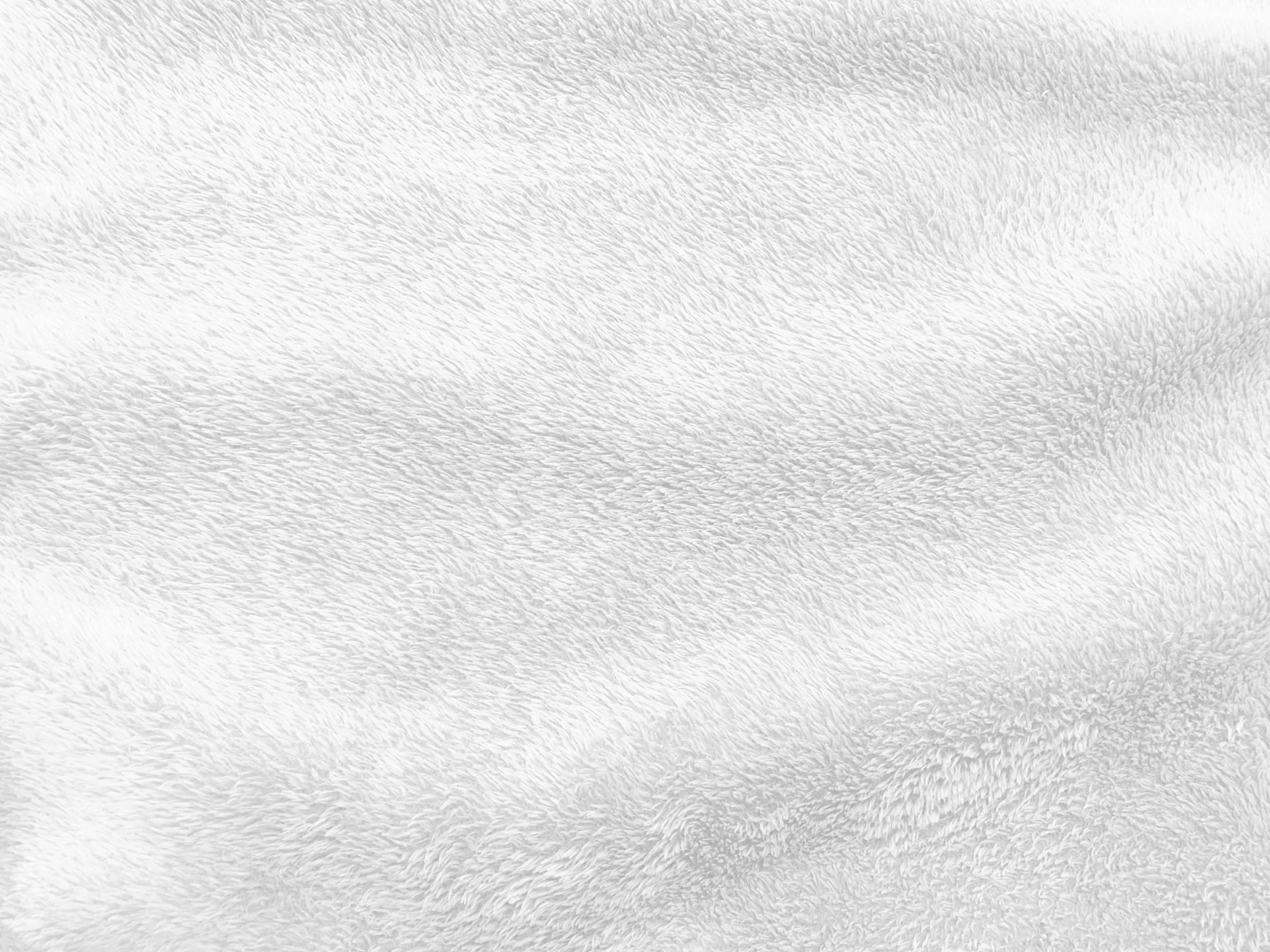 White clean wool texture background. light natural sheep wool. white