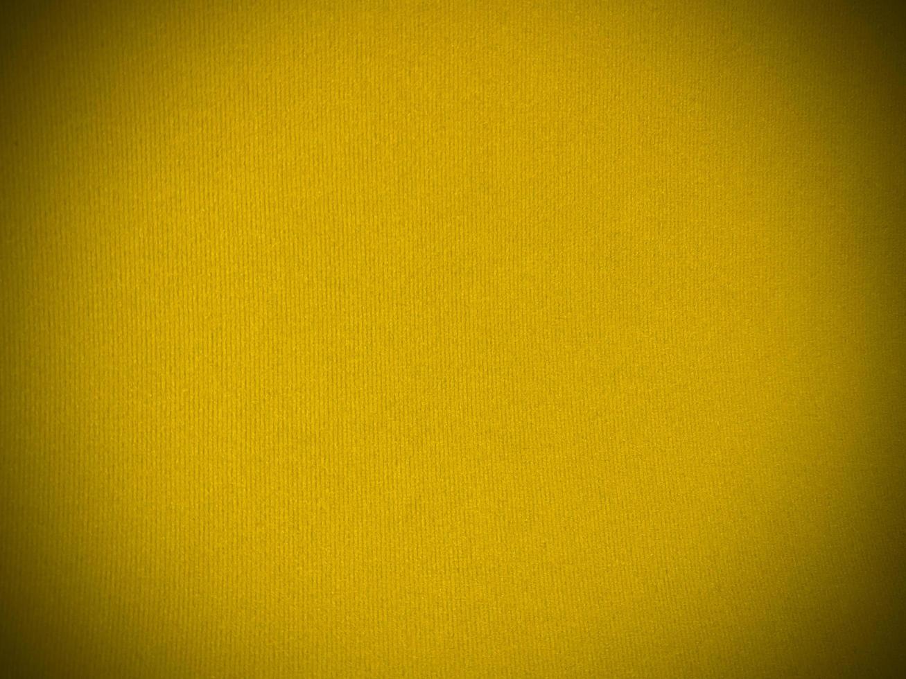 Yellow velvet fabric texture used as background. Empty yellow fabric background of soft and smooth textile material. There is space for text. photo