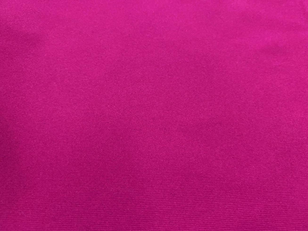 Pink velvet fabric texture used as background. Empty pink fabric background of soft and smooth textile material. There is space for text. photo