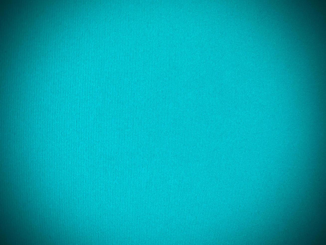 Turquoise velvet fabric texture used as background. Empty turquoise fabric background of soft and smooth textile material. There is space for text. photo