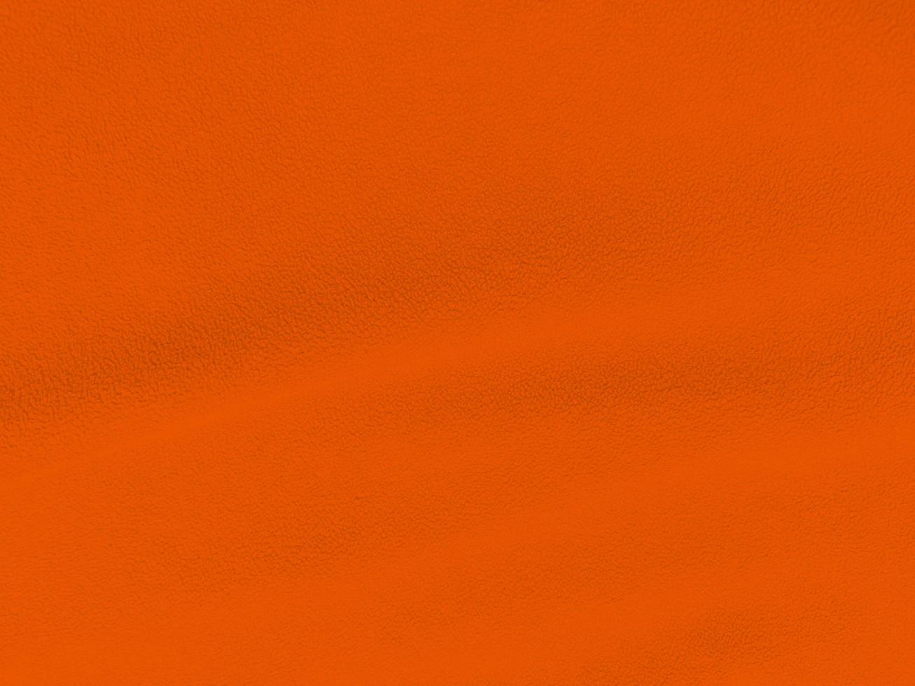 orange clean wool texture background. light natural sheep wool. orange seamless cotton. texture of fluffy fur for designers. close-up fragment white wool carpet.. photo