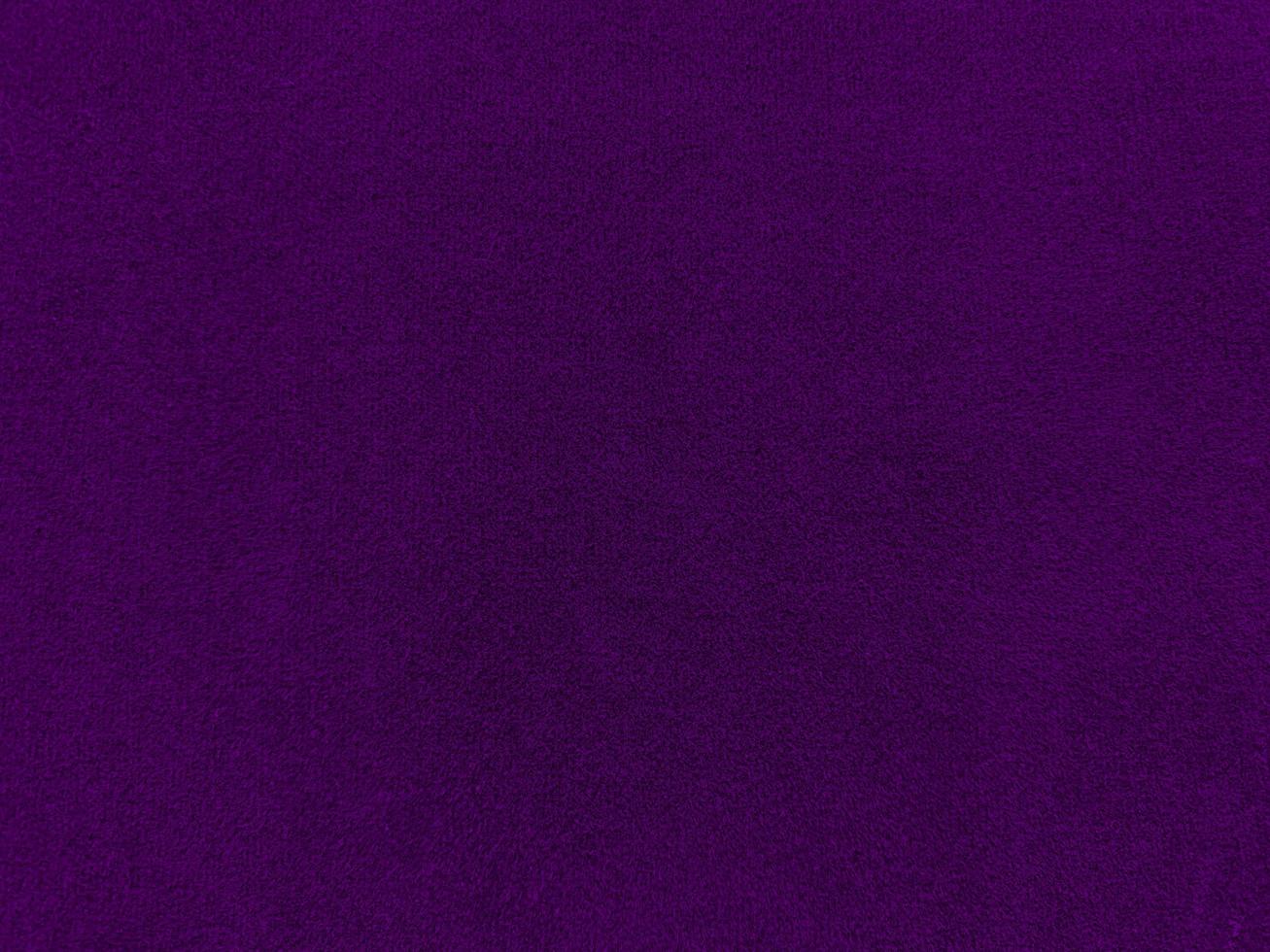 Purple velvet fabric texture used as background. Empty purple fabric background of soft and smooth textile material. There is space for text. photo