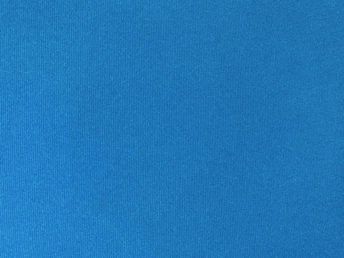 Blue velvet fabric texture used as background. Empty blue fabric background of soft and smooth textile material. There is space for text. photo