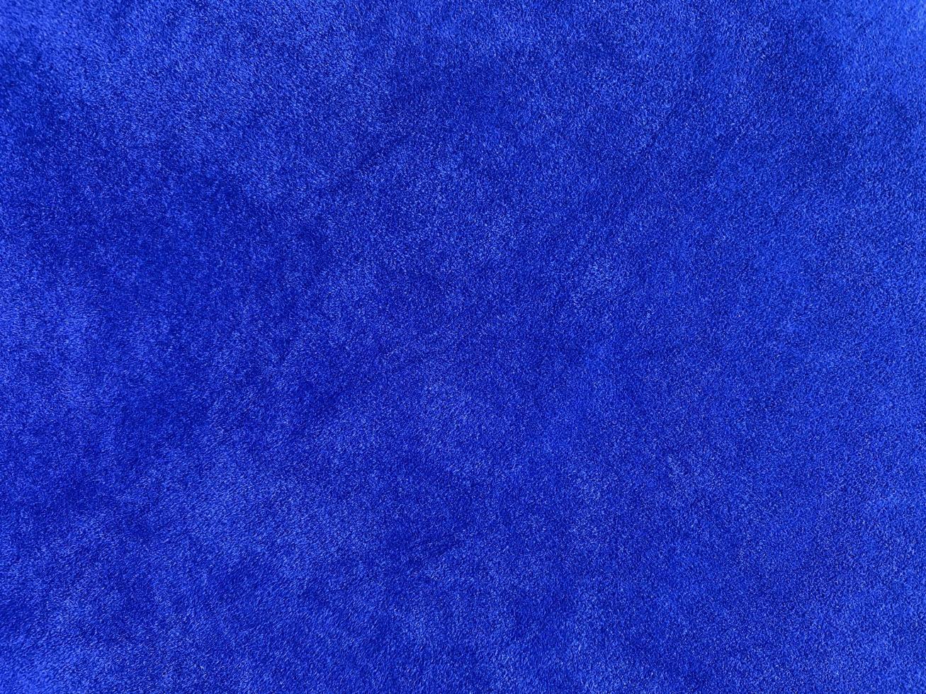 Blue velvet fabric texture used as background. Empty blue fabric background of soft and smooth textile material. There is space for text. photo