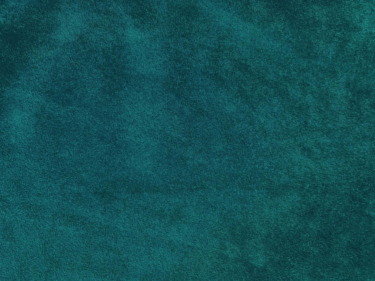 Dark green old velvet fabric texture used as background. Empty green fabric background of soft and smooth textile material. There is space for text. photo