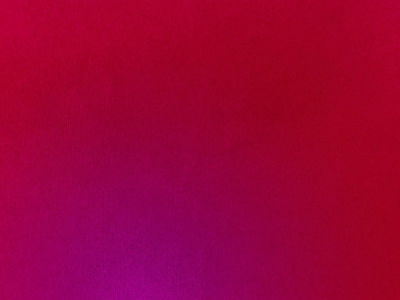 Pink gradient velvet fabric texture used as background. Empty pink fabric background of soft and smooth textile material. There is space for text. photo
