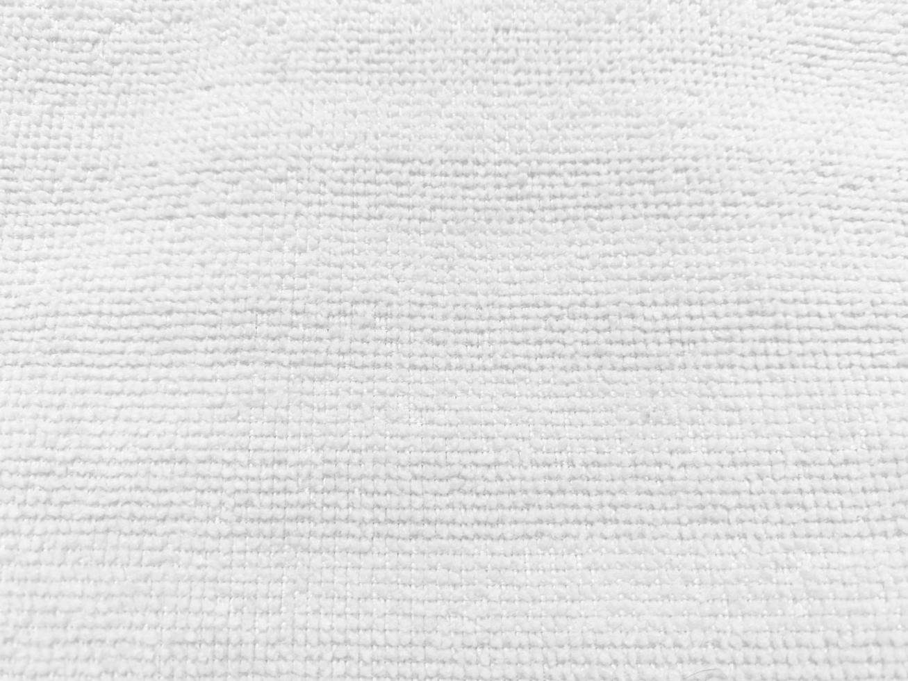 The texture of the old white fabric has a vintage dullness, there is a text area for the background, used for vintage wallpapers and designs. photo