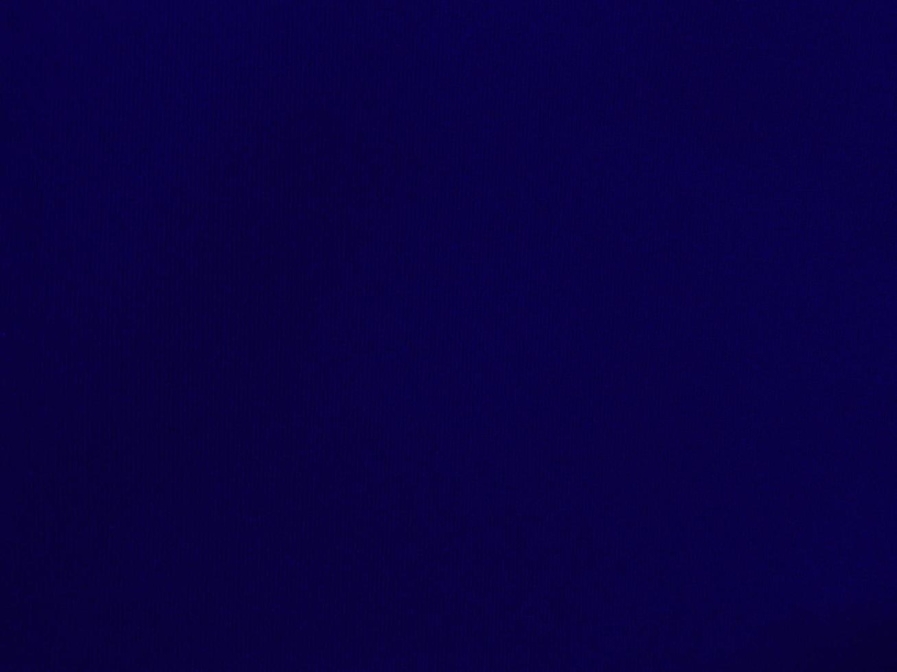 Blue velvet fabric texture used as background. Empty blue fabric background of soft and smooth textile material. There is space for text. photo