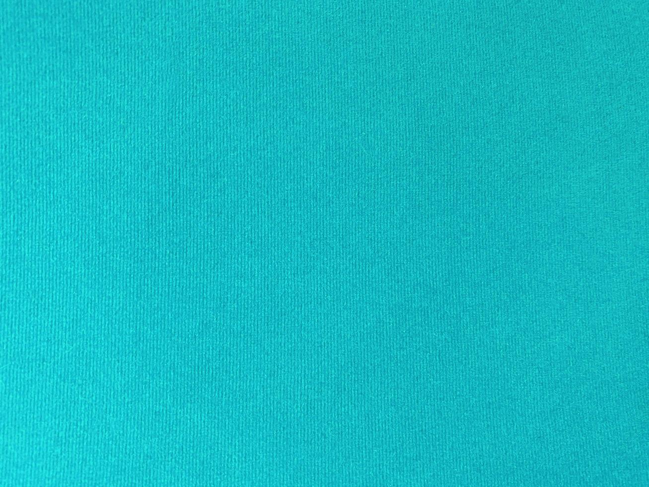 Light blue velvet fabric texture used as background. Empty blue fabric background of soft and smooth textile material. There is space for text. photo