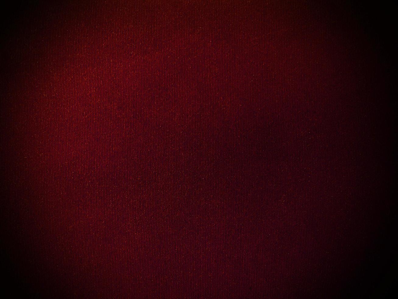 Dark  red velvet fabric texture used as background. Empty red fabric background of soft and smooth textile material. There is space for text. photo