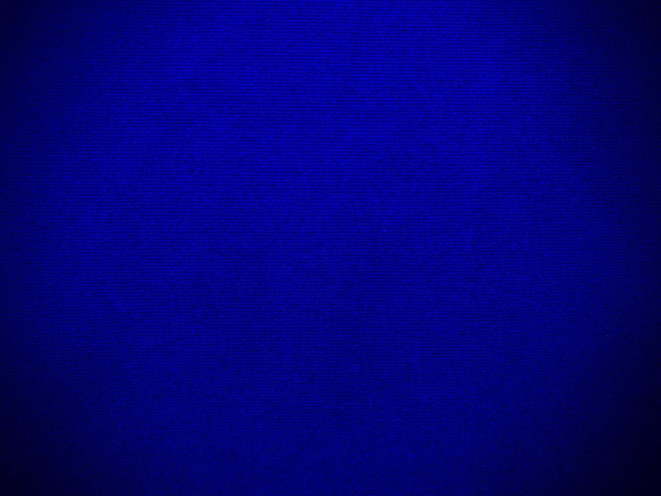 Dark blue velvet fabric texture used as background. Empty dark blue fabric background of soft and smooth textile material. There is space for text. photo