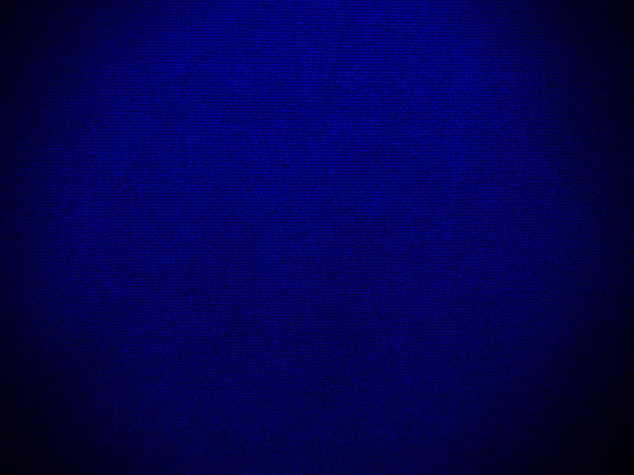 Dark blue velvet fabric texture used as background. Empty dark blue fabric background of soft and smooth textile material. There is space for text. photo