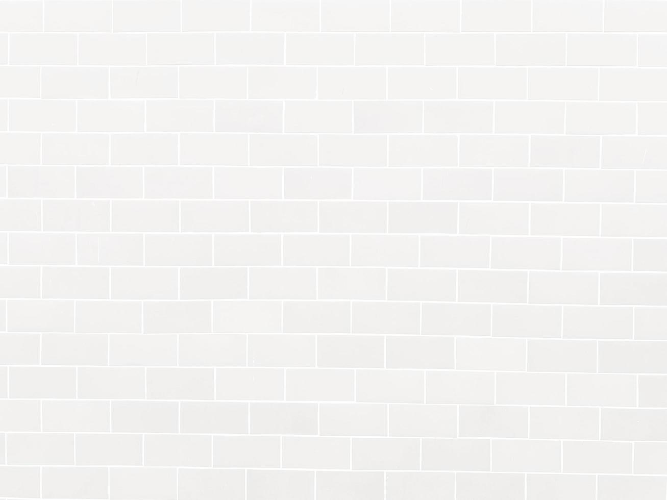 Seamless white cement wall background Vintage style white painted cement wall for creative design use With graphic design and wallpaper texture photo