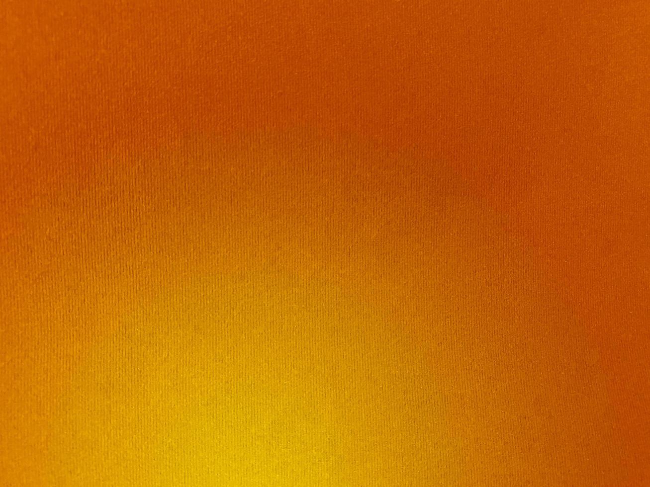 Pastel yellow gradient velvet fabric texture used as background. Empty yellow fabric background of soft and smooth textile material. There is space for text. photo