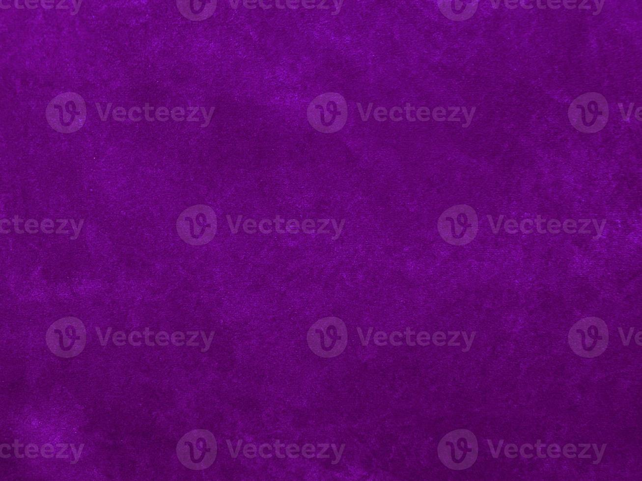 Purple velvet fabric texture used as background. Empty purple fabric background of soft and smooth textile material. There is space for text. photo