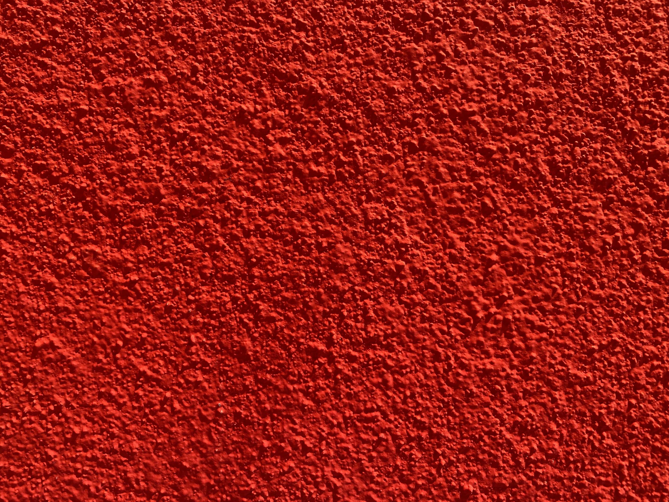 Seamless texture of red cement old wall a rough surface, with space for