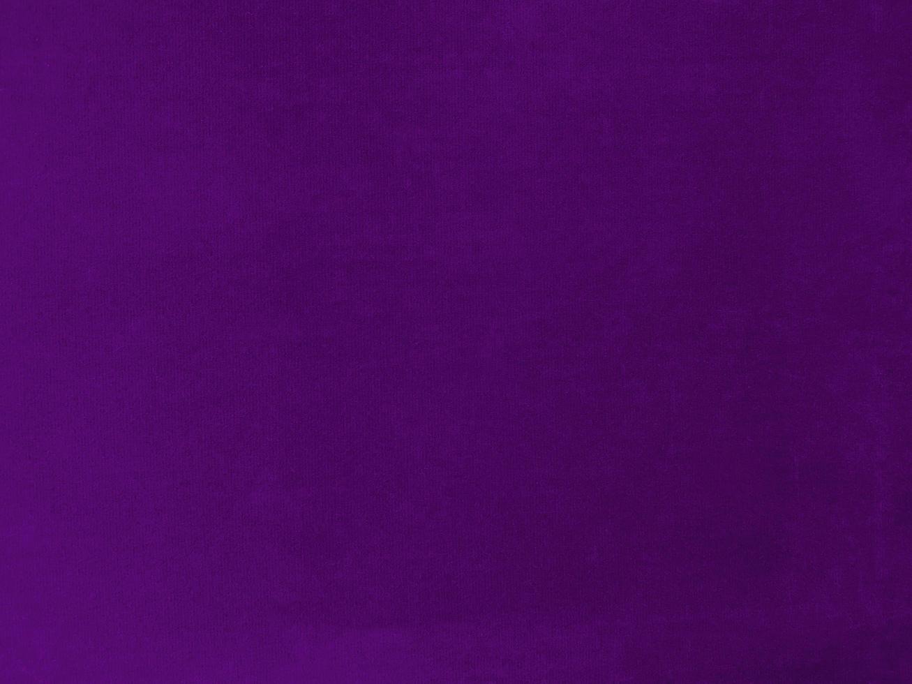 Purple velvet fabric texture used as background. Empty purple fabric background of soft and smooth textile material. There is space for text. photo