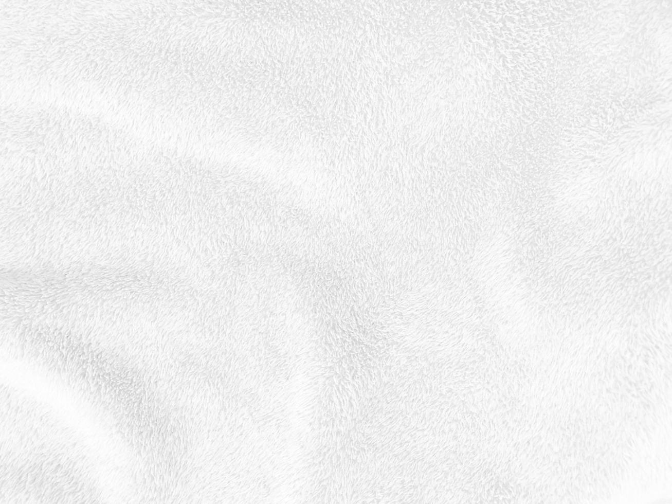 White clean wool texture background. light natural sheep wool. white seamless cotton. texture of fluffy fur for designers. close-up fragment white wool carpet. photo
