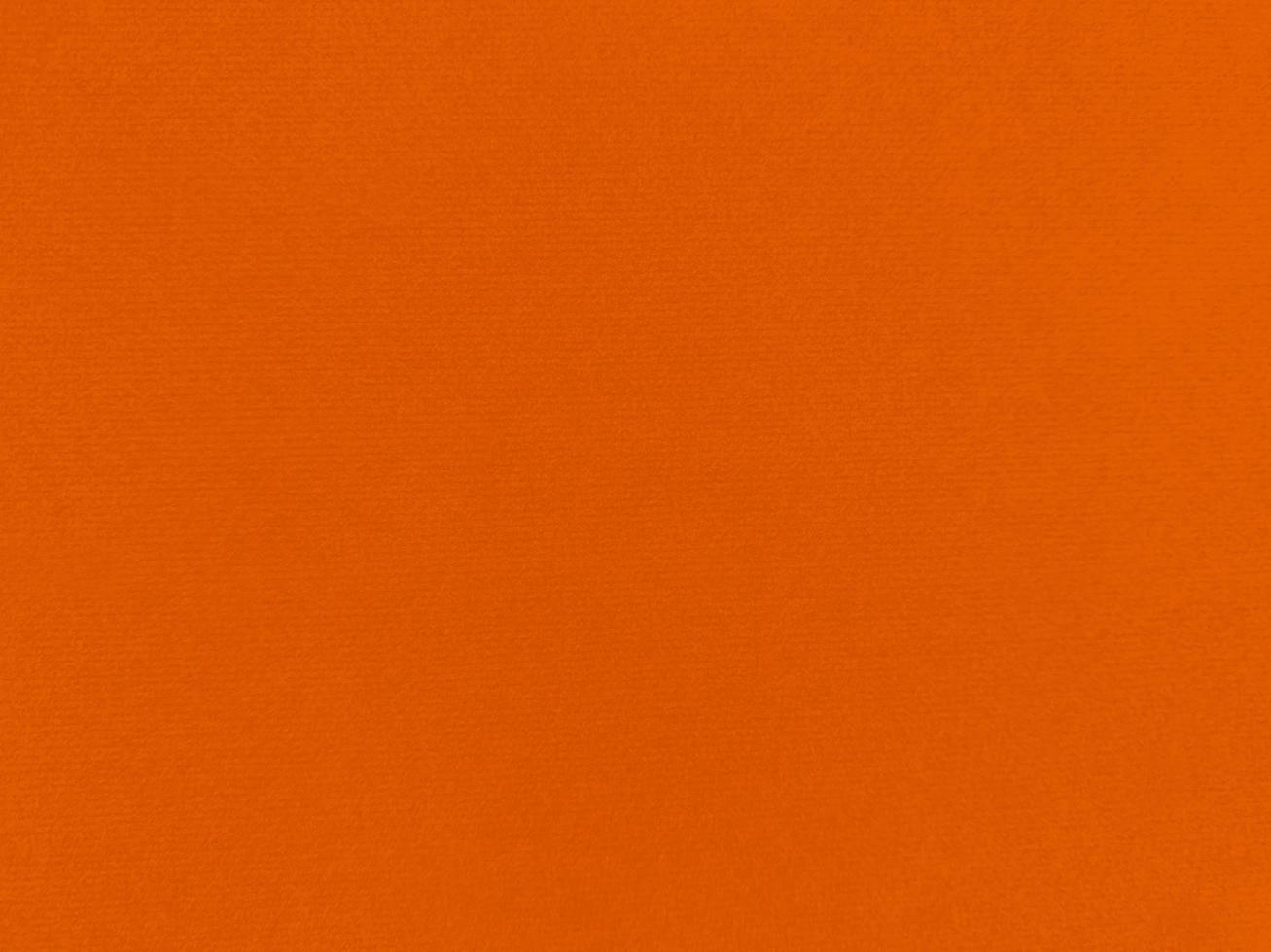 Orange velvet fabric texture used as background. Empty orange fabric background of soft and smooth textile material. There is space for text. photo