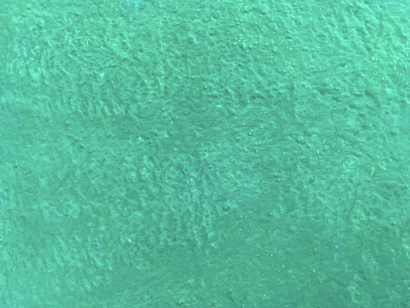 textura transparente de pared de cemento de color oceánico una superficie rugosa, con espacio para texto, para un fondo. foto