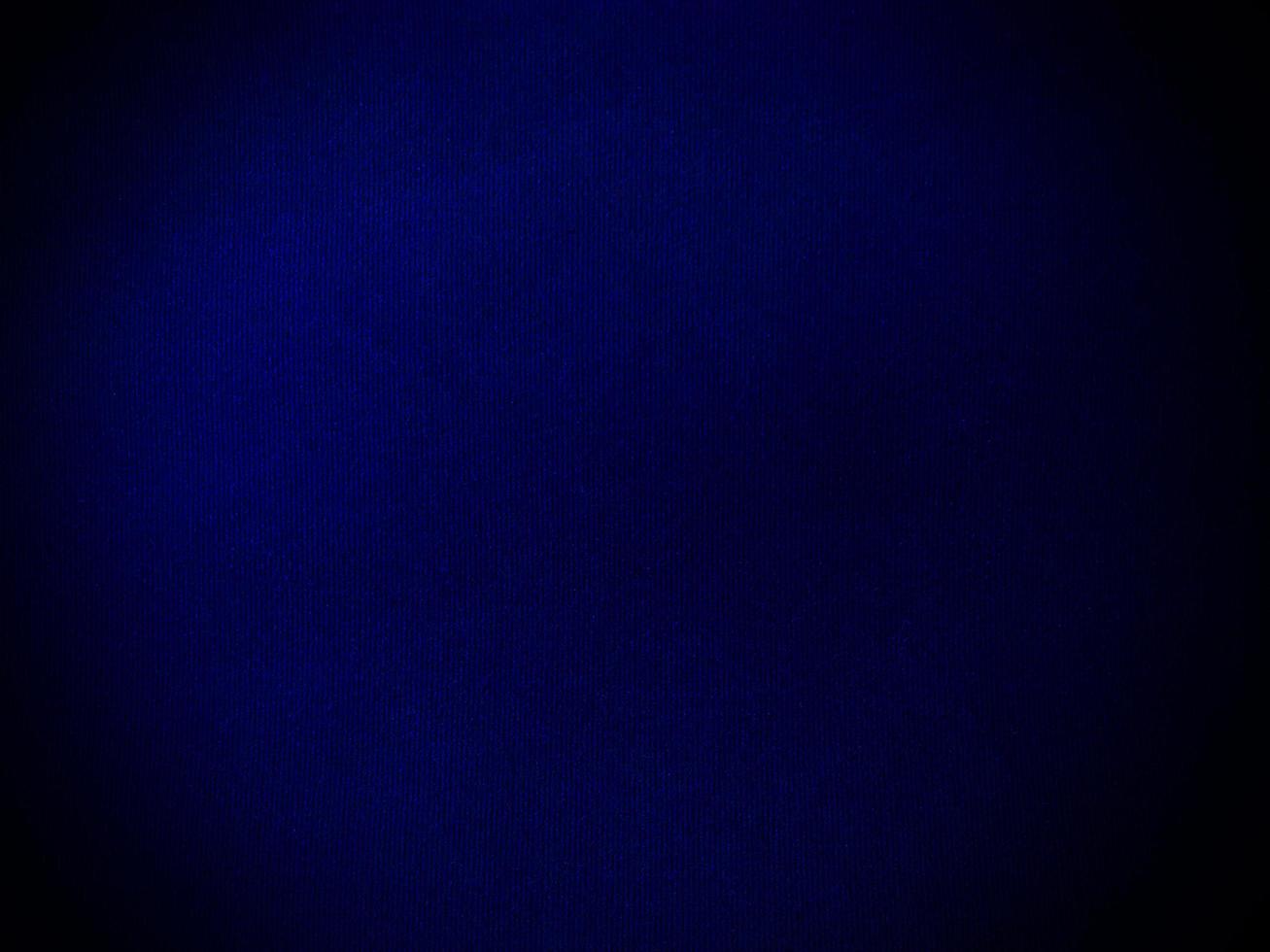Dark blue velvet fabric texture used as background. Empty dark blue fabric background of soft and smooth textile material. There is space for text. photo