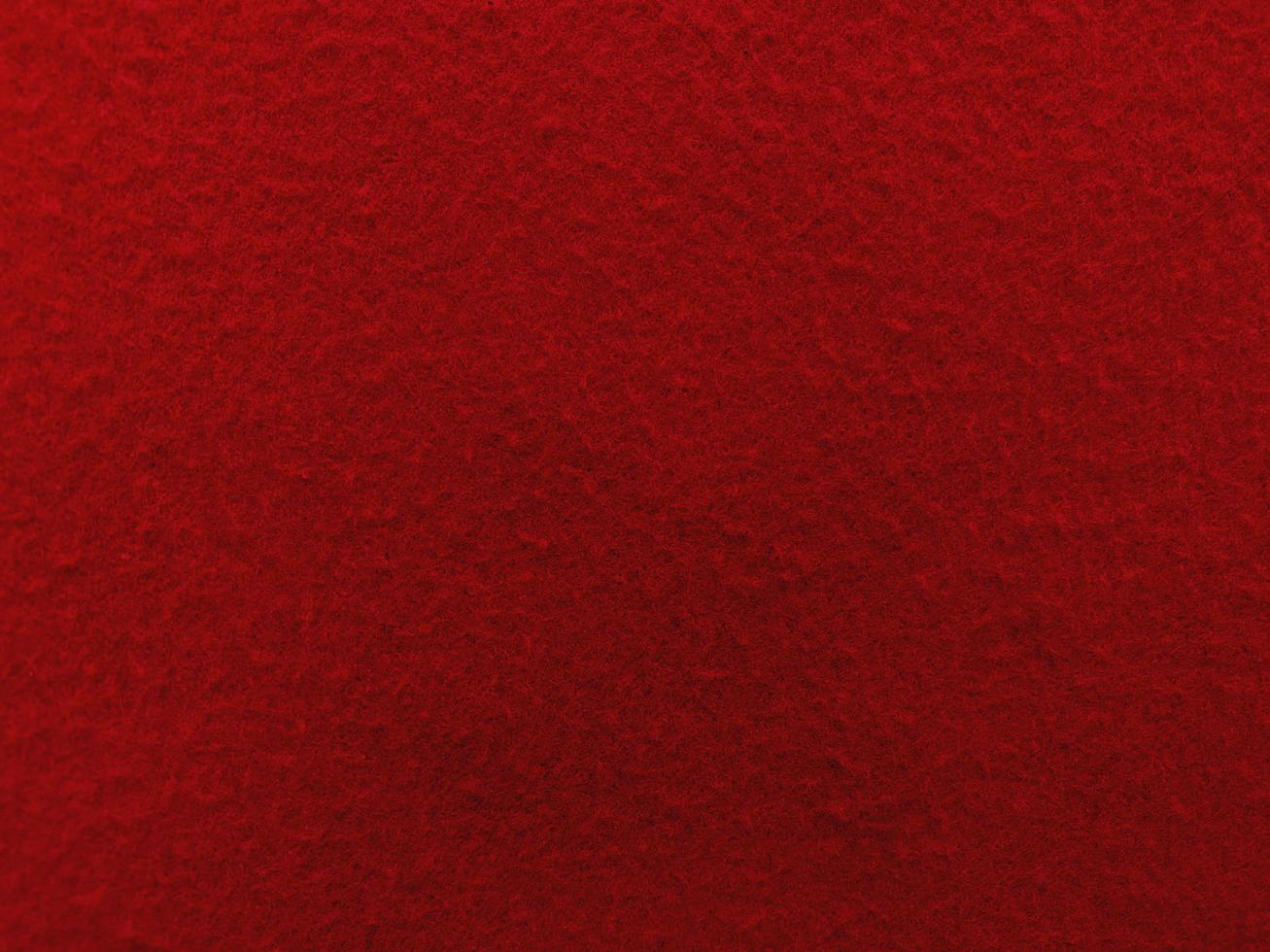 Felt red soft rough textile material background texture close up,poker table,tennis ball,table cloth. Empty red fabric background. photo